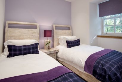 A twin bedroom at Lomond House, Loch Lomond