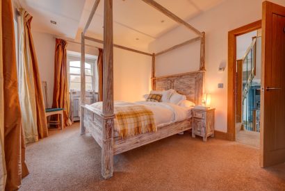 The four poster bed at Lomond House, Loch Lomond