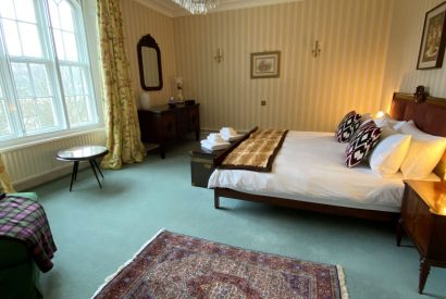 A king size bedroom at Aberfeldy House, Perthshire