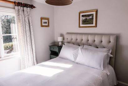 A double bedroom at The Farmhouse, Hampshire