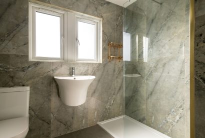 A shower room at Sunset Cottage, Kent