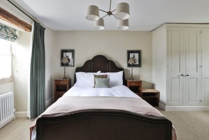 A king size bedroom at Fox Cottage, Cotswolds