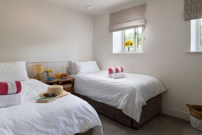 A twin bedroom at Bix Cottage, Chiltern Hills