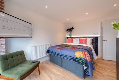 A super king size bedroom at The Pool house, Chapmanslade, Wiltshire