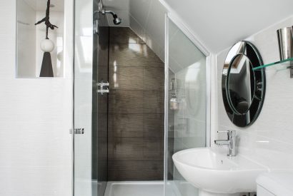 A shower room at Ocean Beach House, Devon