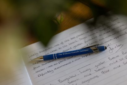 The guest book at The Willows, Oxwich