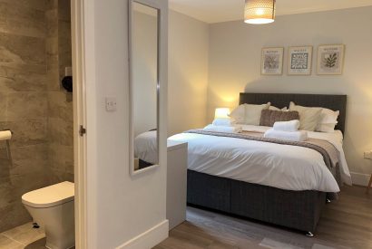 A double bedroom at Honey Stone Cottage, Cotswolds