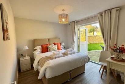 A double bedroom at Honey Stone Cottage, Cotswolds