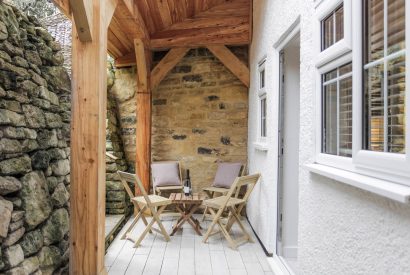 Outdoor seating area at Springhill Cottage, Cotswolds