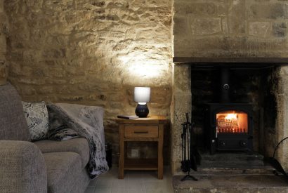 The wood burner at Springhill Cottage, Cotswolds