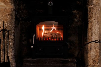 The wood burner at Springhill Cottage, Cotswolds