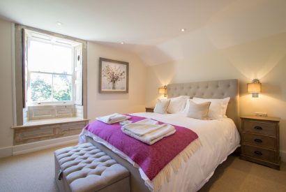 A king size bedroom at Elm Tree Cottage, Somerset