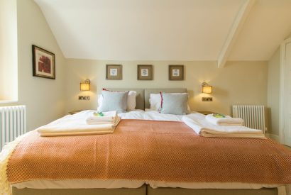 A king sized bedroom at Hawthorn Farmhouse, Somerset