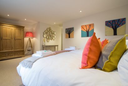 A king sized bedroom at Hawthorn Farmhouse, Somerset