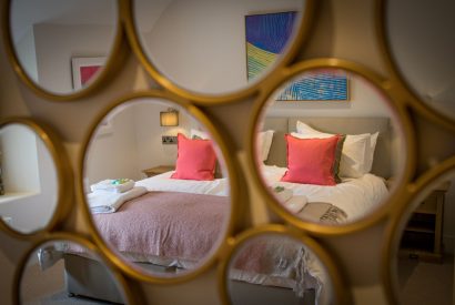 A king sized bedroom at Hawthorn Farmhouse, Somerset