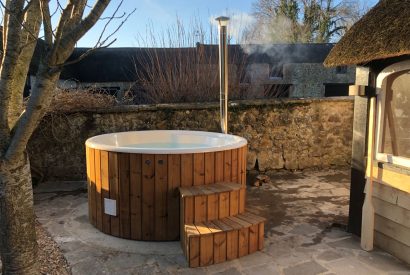 The wood fired hot tub at Hawthorn Farmhouse, Somerset