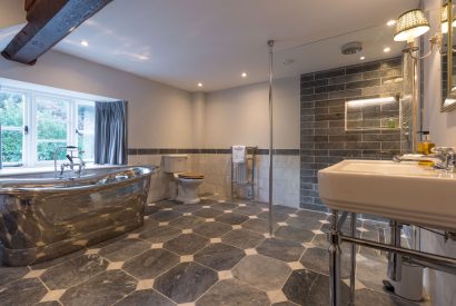 An en-suite bathroom at The Thatched Cottage, Somerset