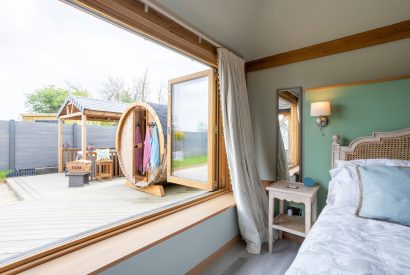 View of the hot tub and sauna at The Lodge at Leigh, Dorset