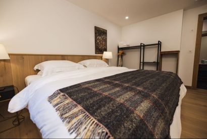 Super king size bedroom at Stone Mason's Cottage, Roundstone, Galway