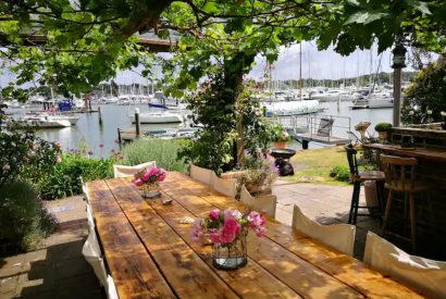 Outdoor dining at Hamble Riverside Cottage, Old Bursledon, Hampshire