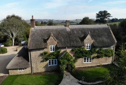 The exterior of The Thatched Cottage, Somerset