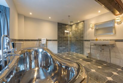 An en-suite bathroom at The Thatched Cottage, Somerset