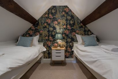 A twin bedroom at The Thatched Cottage, Somerset