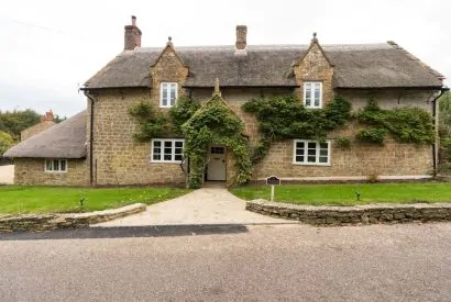 The exterior of The Thatched Cottage, Somerset