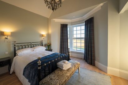 A king sized bedroom at Heatherglen House, Perthshire