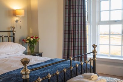 A king sized bedroom at Heatherglen House, Perthshire