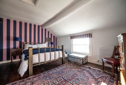 A king size bedroom at Mihangel House, Denbighshire 