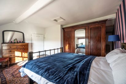 A king size bedroom at Mihangel House, Denbighshire 
