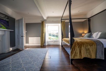 The four poster bedroom at Mihangel House, Denbighshire