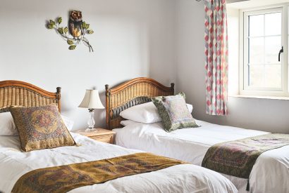 A twin bedroom at Blackdown Cottage, Devon