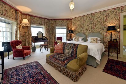 A twin bedroom at Broughton Hall, Yorkshire Dales