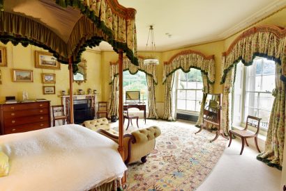 A four poster bedroom at Broughton Hall, Yorkshire Dales