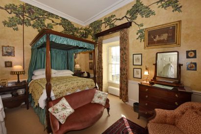 A four poster bedroom at Broughton Hall, Yorkshire Dales