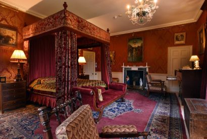 A four poster bedroom at Broughton Hall, Yorkshire Dales