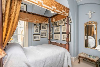 A four poster bedroom at Broughton Hall, Yorkshire Dales