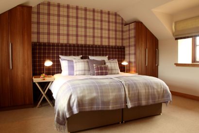 A super king size bedroom at Stuart House, St Andrews