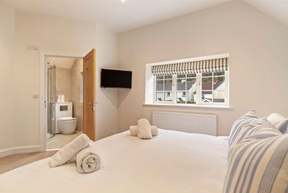 A king size bedroom at Oxwich Retreat, Gower