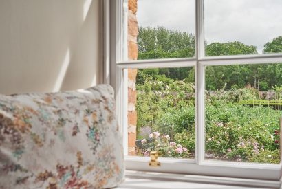 A bedroom at Gardeners Cottage, Cumbria