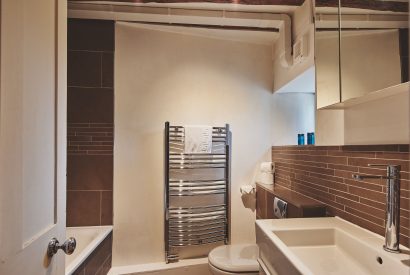 A bathroom at Crooked Cottage, Cotswolds