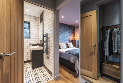 A double bedroom with ensuite at Porthleven View, Cornwall
