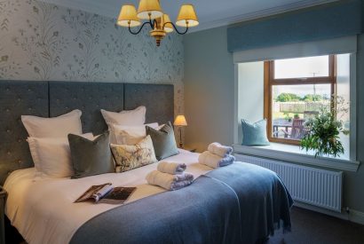 A super-king size bedroom at Macduff House, St Andrews
