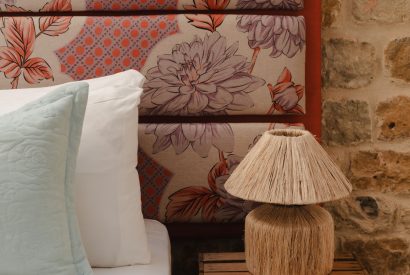 A super-king size bedroom at Penelope's Tower, Wiltshire