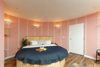A king-sized bedroom at Penelope's Tower, Wiltshire