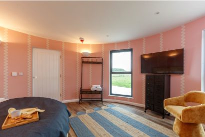 A king-sized bedroom at Penelope's Tower, Wiltshire