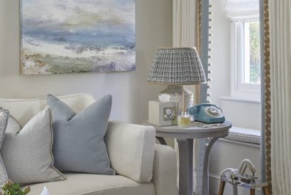 The living room with beach decor at The Beach House, Devon
