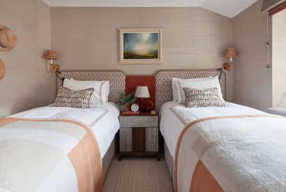 A twin bedroom at Beatrix Cottage, Lake District